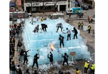 Drake Fans Smash Ice Block for Album Date, Police Intervene